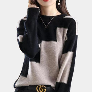 Women's black and gray high-neck wool blend sweater with geometric patterns, featuring long sleeves and a relaxed fit.
