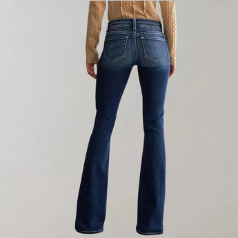 Dark wash flared stretch jeans for women featuring a high-waist design, showcasing the legs and waist area.