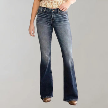Women's high-waist dark wash flared stretch jeans in marine blue displayed, showcasing the waist, thigh, and knee areas. The jeans are paired with a leather jacket, emphasizing the denim texture and fit.