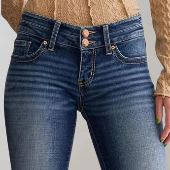 Women's high-waist dark wash flared stretch jeans displayed on a mannequin, showcasing the fit around the waist and thighs with a focus on the flared leg design. The denim fabric has a dark wash appearance.