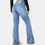 Women's high-waist flared black jeans made of slim fit stretch denim, showcasing the waistline and flared cut with emphasis on the thigh and knee areas.