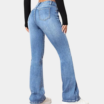 Women's high-waist flared black jeans made of slim fit stretch denim, showcasing the waistline and flared cut with emphasis on the thigh and knee areas.