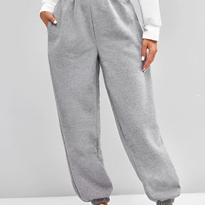 Women's high-waist grey sweatpants in a comfy oversized jogger style, shown in size 2XL, featuring a relaxed fit with visible waist and leg details.