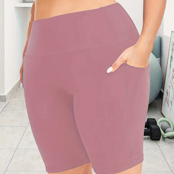 Women's high-waist purple gym shorts, breathable and anti-slip, shown on model from waist down.