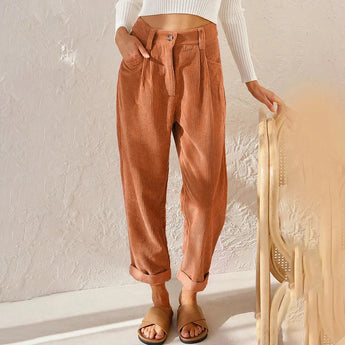 Women's high-waisted terracotta corduroy cropped pants in orange, size 3XL, showcasing a fashionable fit with emphasis on the waist, thigh, and knee areas.