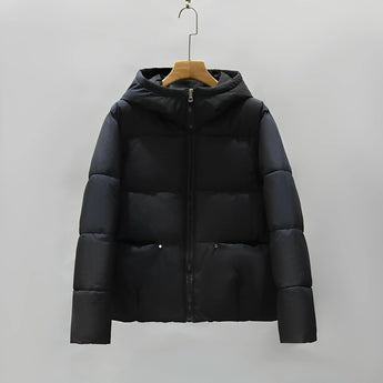 Women's black and grey color block insulated puffer jacket with a hood, featuring long sleeves, a collar, and multiple pockets; shown in size 2XL.
