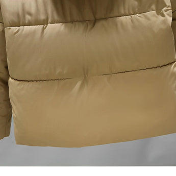 Women's hooded color block insulated puffer jacket featuring a beige and khaki color scheme, with a comfortable fit, long sleeves, and a fur-lined collar.