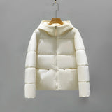 Women's beige hooded color block insulated puffer jacket in size 2XL with long sleeves and a fashionable design.