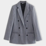 Women's gray houndstooth double-breasted blazer, featuring a classic collar, long sleeves, and button detailing, perfect for autumn fashion.