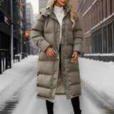 Women's insulated taupe hooded puffer coat featuring a long design, with a plush fur-trimmed hood and full-length sleeves, ideal for winter weather.