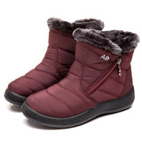Black winter snow boots for women with insulated waterproof design and fur lining, suitable for outdoor activities.