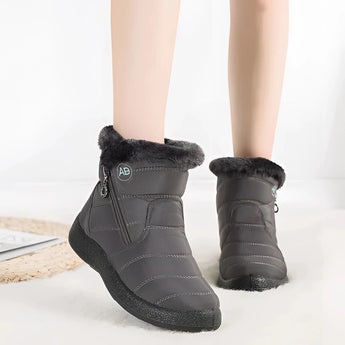 Women's insulated waterproof fur-lined winter snow boots in gray, size 43, featuring durable construction and stylish design suitable for cold and wet weather conditions.