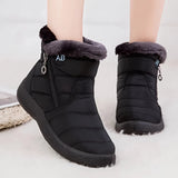 Women's black insulated waterproof winter snow boots with fur lining, designed for outdoor use, featuring synthetic rubber soles.