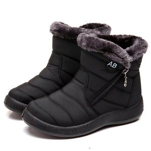 Women's insulated waterproof black winter snow boots with fur lining, designed for cold weather and outdoor activities.
