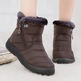 Brown women's insulated waterproof fur-lined winter snow boots.