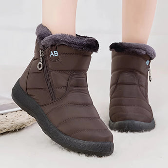 Brown women's insulated waterproof fur-lined winter snow boots.