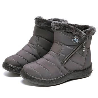Women's insulated waterproof black winter snow boots with fur lining, made with synthetic rubber material, designed for outdoor use and protection against snow and cold weather.