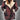 Women's red insulated winter parka in size 5XL featuring a faux fur hood, showcasing its warm and waterproof material with a focus on detailing like the collar, sleeves, and waist design.