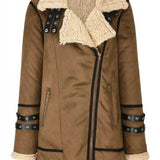 
A beige women's insulated winter parka hanging on a clothes hanger, featuring a faux fur hood and a waterproof design for warmth and protection.