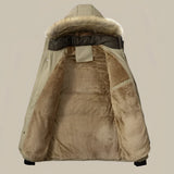 Women's khaki puffer coat with a faux fur hood, featuring long sleeves and a cozy collar. The coat is lightweight and eco-friendly, with a warm and stylish design that includes beige and grey tones.