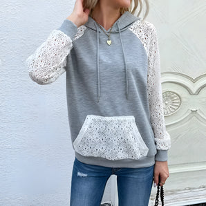 Women's black hoodie with lace sleeves, featuring a fashionable spring design. The pullover showcases intricate lace detailing on the sleeves, with a comfortable fit around the shoulders, neck, and waist.