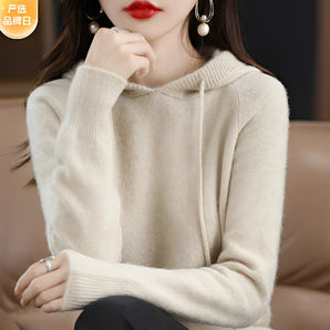 Women's light beige crew neck knit sweater in 2XL, featuring long sleeves and an elegant winter fashion design. The sweater is styled to highlight the neckline and collar area, conveying a cool and sophisticated appearance.