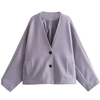 Women's light purple minimalist two-button tailored blazer with a sleek design, featuring a notched collar, long sleeves, and a smooth finish.