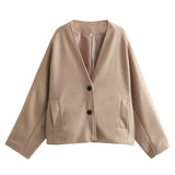 Women's light purple minimalist tailored blazer featuring a two-button closure, long sleeves, and a structured collar. The blazer has a sleek and formal design suitable for professional or formal occasions.
