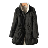 Women's lightweight black hooded puff jacket in size 3XL, featuring a water-resistant material with a sleek design, equipped with a collar, sleeves, and functional pockets.
