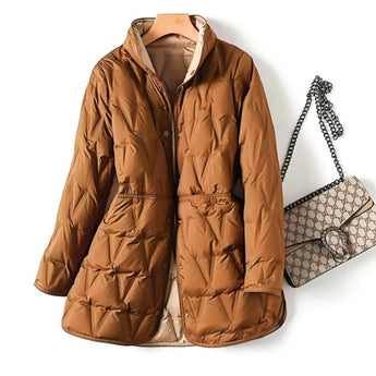 Women's lightweight black hooded puff jacket displayed on a mannequin, showcasing its water-resistant, stylish design with a sleek collar and long sleeves.