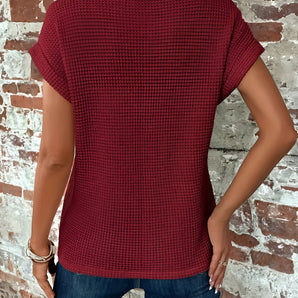Women's lightweight red short-sleeve knit top suitable for summer casual wear, featuring a comfortable fit and stylish design that highlights the neckline and shoulders.