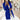 
A blue 5XL women's blazer with long sleeves and a tailored chic fashion design, featuring an oversized fit and a classic collar.