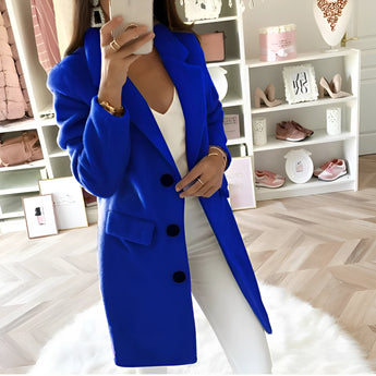 
A blue 5XL women's blazer with long sleeves and a tailored chic fashion design, featuring an oversized fit and a classic collar.