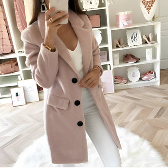 
A women's long black oversized blazer with a tailored chic fashion design, featuring a rose color variant and size 5XL. The blazer has a classic collar, long sleeves, and a structured waist, showcased on a white background.