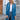 Women's long oversized zip-up hoodie in a vibrant blue color, styled as urban streetwear. The hoodie is worn by a model standing confidently, with the garment featuring a hood, long sleeves, and a relaxed fit.