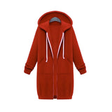 Women's long oversized zip-up hoodie in orange, featuring a streetwear style with a large collar and long sleeves, designed for an urban look.