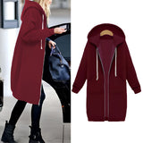 Women's long blue oversized zip-up hoodie with a streetwear style, featuring long sleeves and a casual fit.