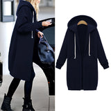 Women's long blue oversized zip-up hoodie featuring a casual urban streetwear style, designed with long sleeves, a full-length zipper, and a comfortable fit.
