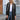 Women's long blue oversized zip-up hoodie styled with urban streetwear elements, featuring a relaxed fit with long sleeves. Model is accessorizing with black sunglasses.