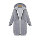 Gray oversized zip-up hoodie featuring long sleeves and a comfortable fit, suitable for urban streetwear.