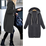 Women's long blue oversized zip-up hoodie with a casual urban streetwear style, featuring a relaxed fit and long sleeves.