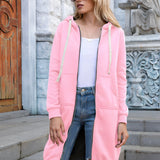 A woman wearing a long blue oversized zip-up hoodie and sunglasses, styled as urban streetwear.