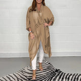 
A women's long flowy grey kimono cardigan in a versatile summer wrap style, shown in a khaki color and size 5XL, featuring loose sleeves and a lightweight, draping design ideal for casual or elegant layering.