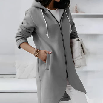 Woman wearing a gray 5XL long asymmetric zip hoodie featuring a stylish design with a collar and long sleeves.