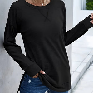 Women's long sleeve black top in Nero, size 2XL, featuring a chic and versatile design with a comfortable fit, shown on a mannequin displaying the shoulder and arm areas.