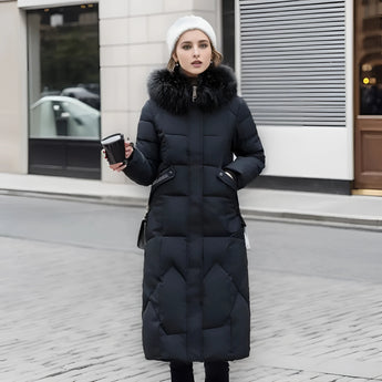 Black women's long winter coat with fur hood, insulated and quilted parka design; features include a jointed style, overcoat length extending to thighs, full sleeves, fashion-forward waist design, and knee-length, suitable for cold weather.