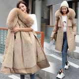 Women's long winter parka in khaki with a blue fur collar, featuring an adjustable waist and designed for warmth and fashion, size 6XL.