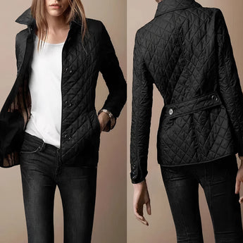 Luxury women's red quilted slim fit jacket in Nero color, featuring designer fashion elements. The jacket is modeled on a mannequin showcasing its elegant shoulder and arm design, highlighting its high-end textile quality.