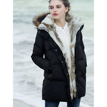 Women's luxury white puffer jacket with a fur hood, featuring a stylish and warm design, perfect for winter.