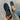 Women's navy blue lightweight mesh slip-on walking shoes with breathable material, shown on a foot.
